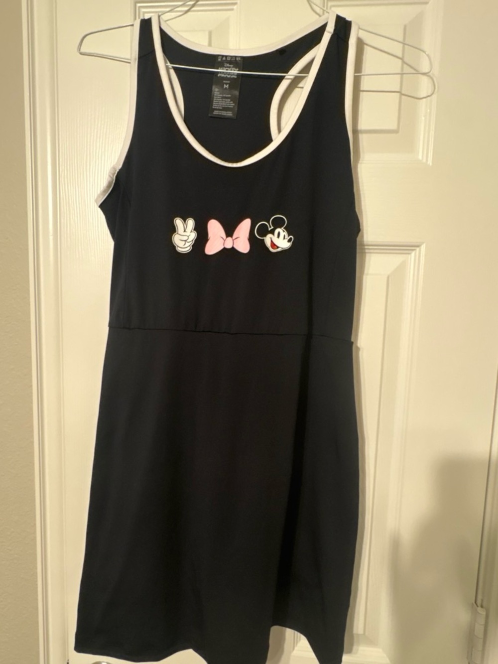 Disney women's black Minnie Mouse Tank Dress/skort with Pink Bow